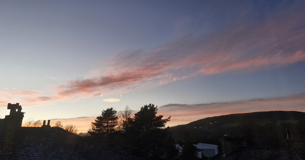 View of Cribden from Rawtenstall at sunset